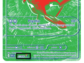 Eine Nahaufnahme einer Pokémon-Karte, auf der die Attacke „Psychokraft“ mit den entsprechenden Werten abgebildet ist; unten ist ein „G/RGB“-Symbol hervorgehoben.
